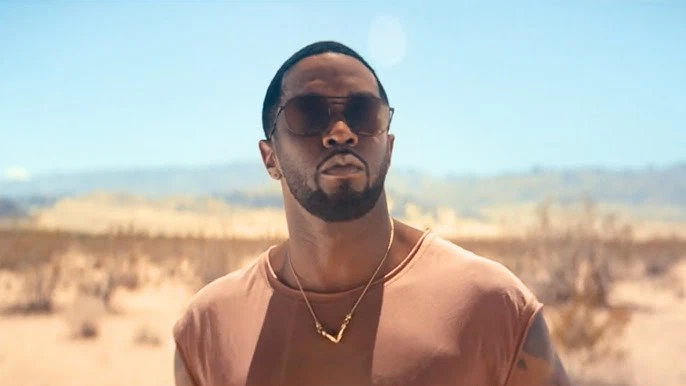 a still from the music video of Closer to God by Diddy