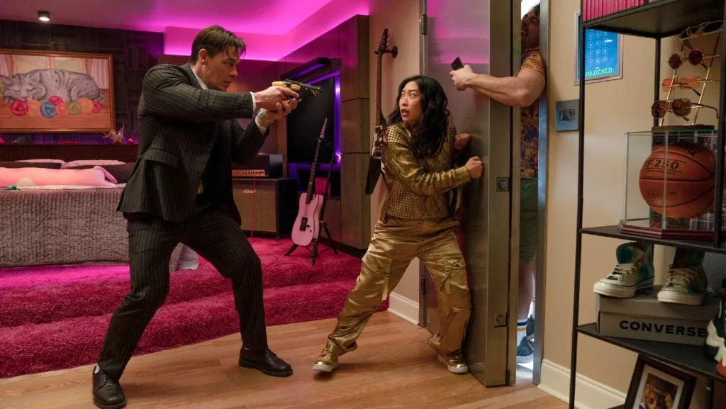 John Cena and Awkwafina in an action scene in Jackpot!