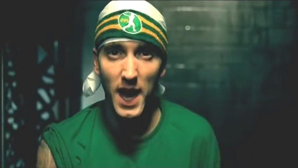 Eminem in his Sing For The Moment music video 