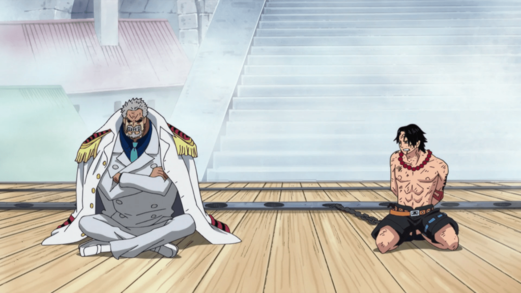 Garp with Ace on the execution platform at Marineford in One Piece.