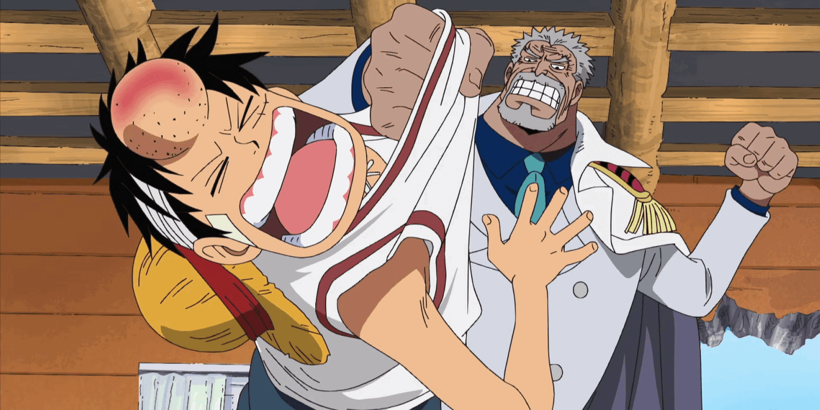 Garp using "first of love" against Luffy in One Piece. 