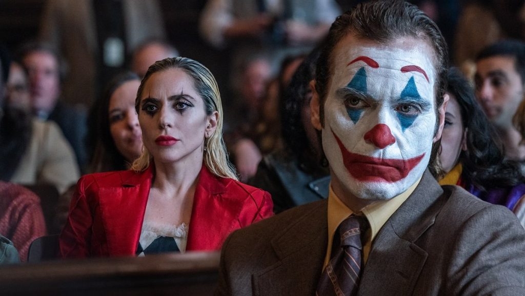 Joaquin Phoenix and Lady Gaga in a courtroom still from Joker: Folie à Deux