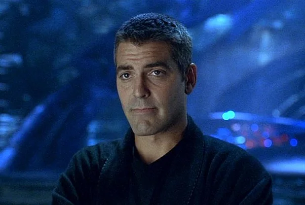 George Clooney as Bruce Wayne