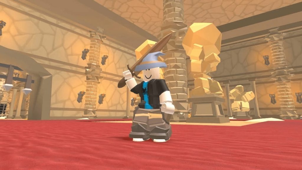 A character with sword is seen standing on a red floor in a golden-ish dungeon.