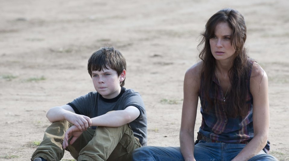 The rivalry between Rick and Shane plays out against the backdrop of a chaotic love story involving Lori, showcasing shifting loyalties.