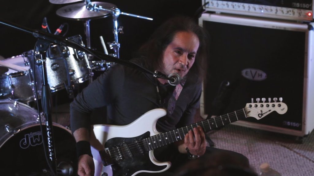 Jake E. Lee in Bark At The Moon MV.