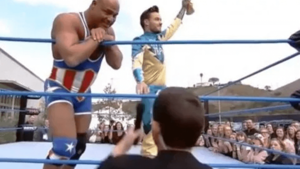 Liam Payne beating Kurt Angle in a wrestling match | Credits: @guydirection/YouTube