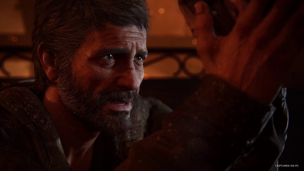 the image shows joel and ellir talking in The last of Us