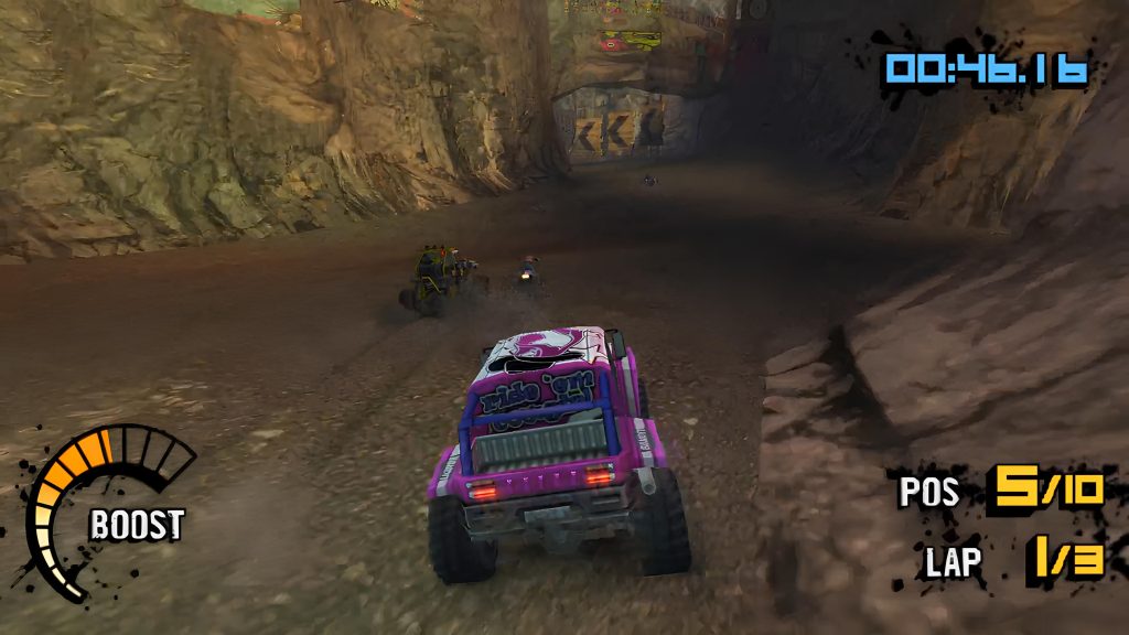 A still from MotorStorm: Arctic Edge on the PlayStation Portable, featuring an in-game race.