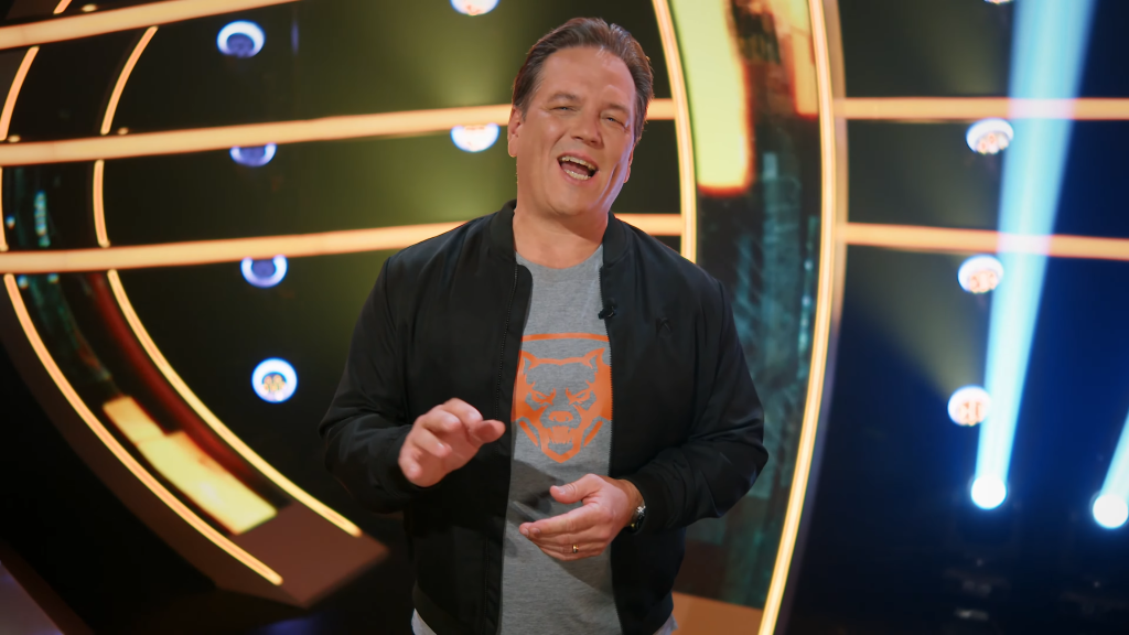 Image of Phil Spencer, the CEO of Microsoft Gaming, speaking at an event. 