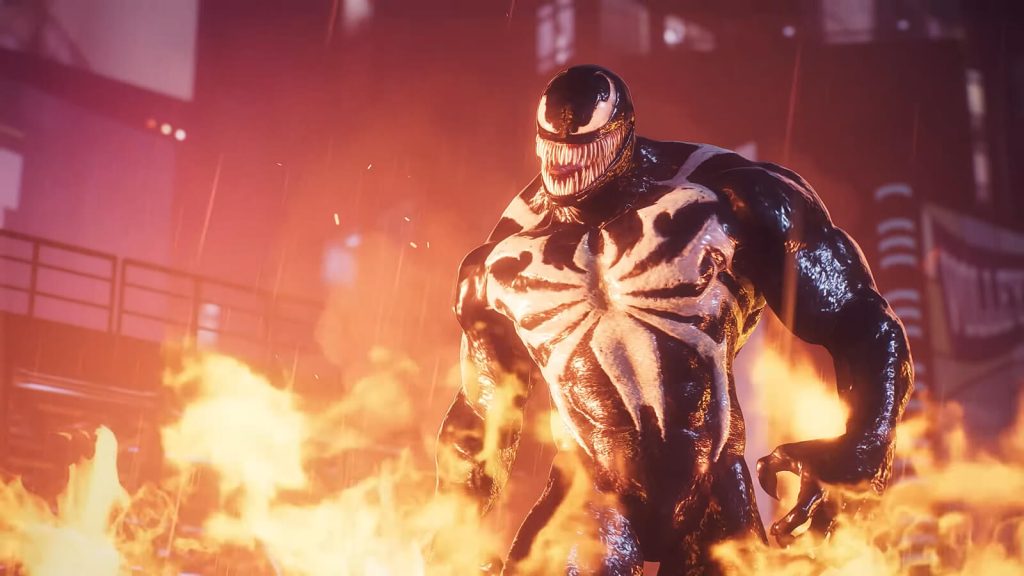 A close-up of one of Marvel's Spider-Man 2's antagonists, Venom, emerging from flames.