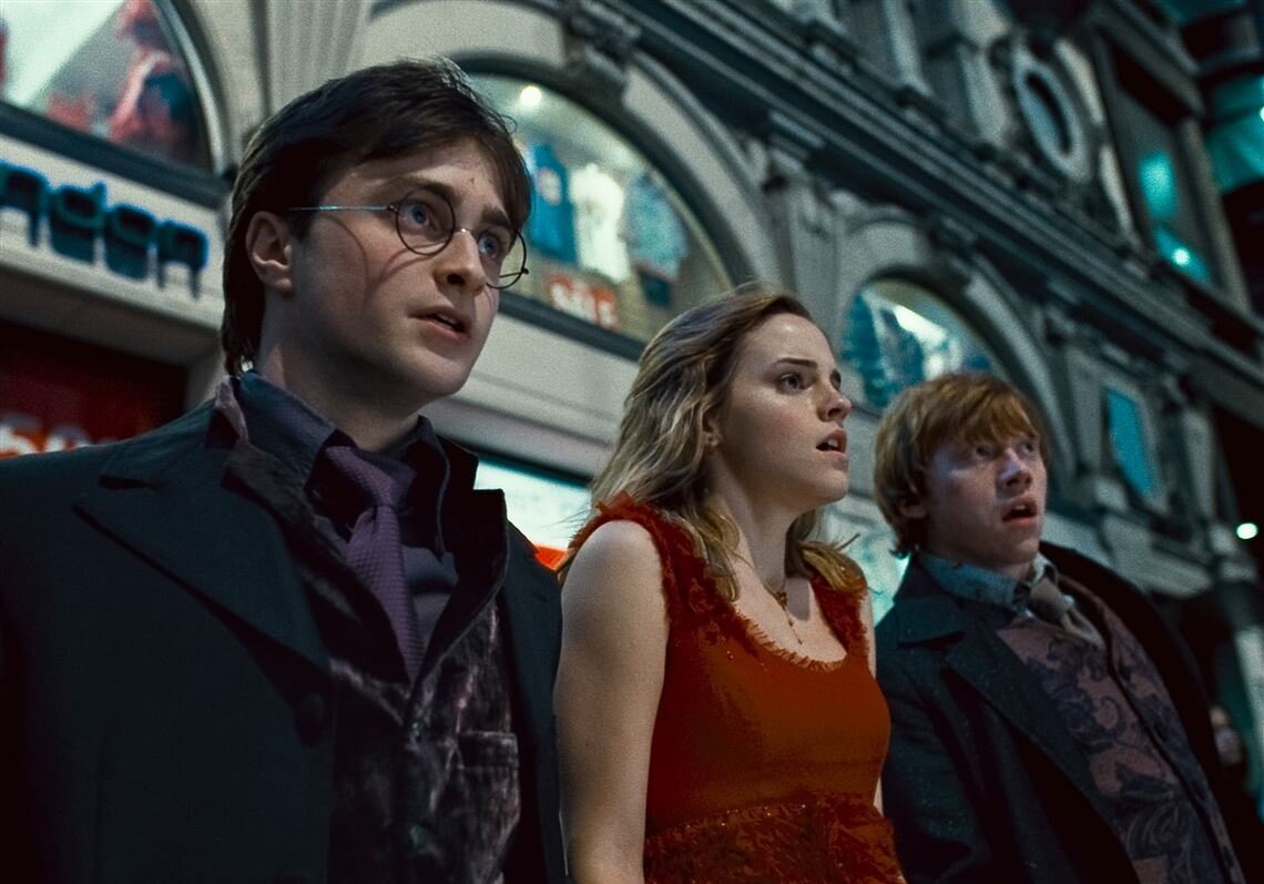 Daniel Radcliffe, Emma Watson, and Rupert Grint in Harry Potter and the Deathly Hollows. 