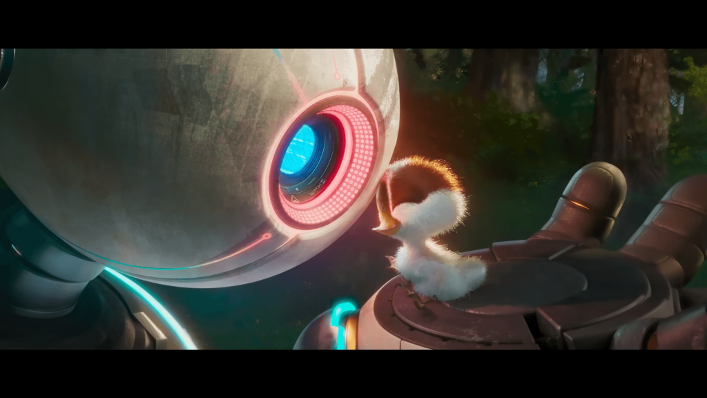 The image shows Roz embracing the chick in The Wild Robot 