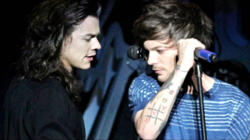 Louis Tomlinson and Harry Styles in Still the One music video | Credits: Syco