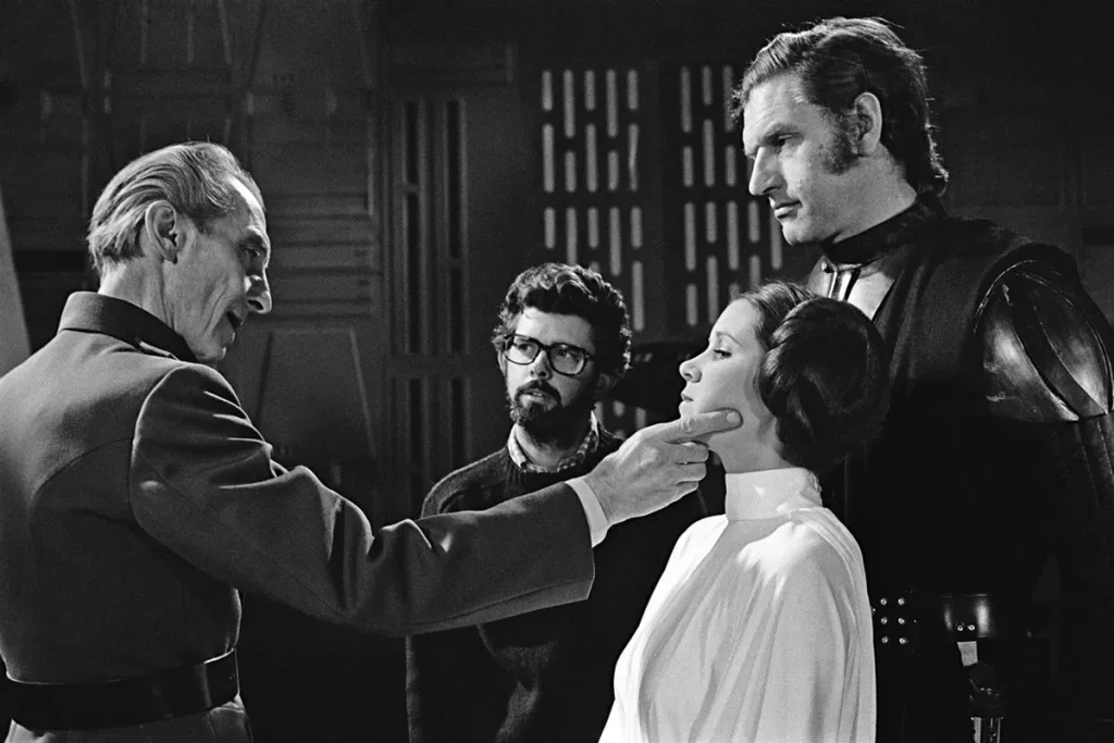 Tarkin (L) George Lucas (C), Princess Leia (R), Darth Vader (ER) behind the scenes | Credits: 20th Century Fox