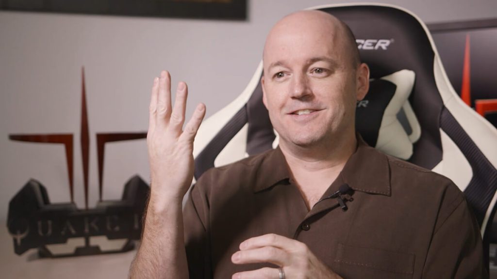 Picture of Tim Willits, the present chief creative officer of Saber Interactive, speaking at an interview. 