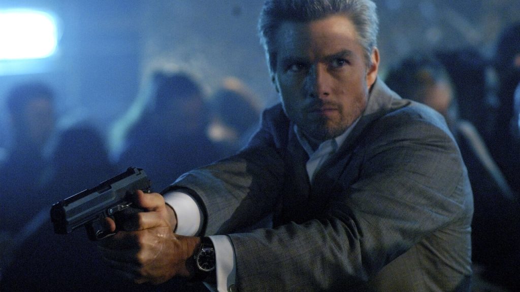 Tom Cruise as Vincent, a cold, calculating, and highly skilled hitman, in Collateral