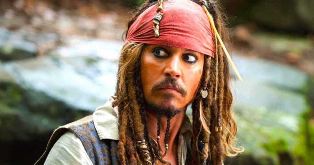 Johnny Depp as Captain Jack Sparrow, a quirky, cunning, and often hilarious pirate, in The Pirates of the Caribbean