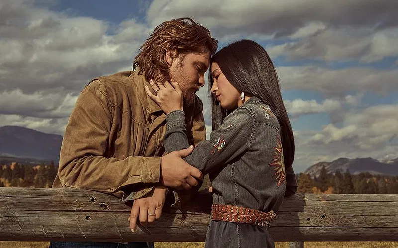 Luke Grimes and Kelsey Asbille in Yellowstone | Credits: Paramount+