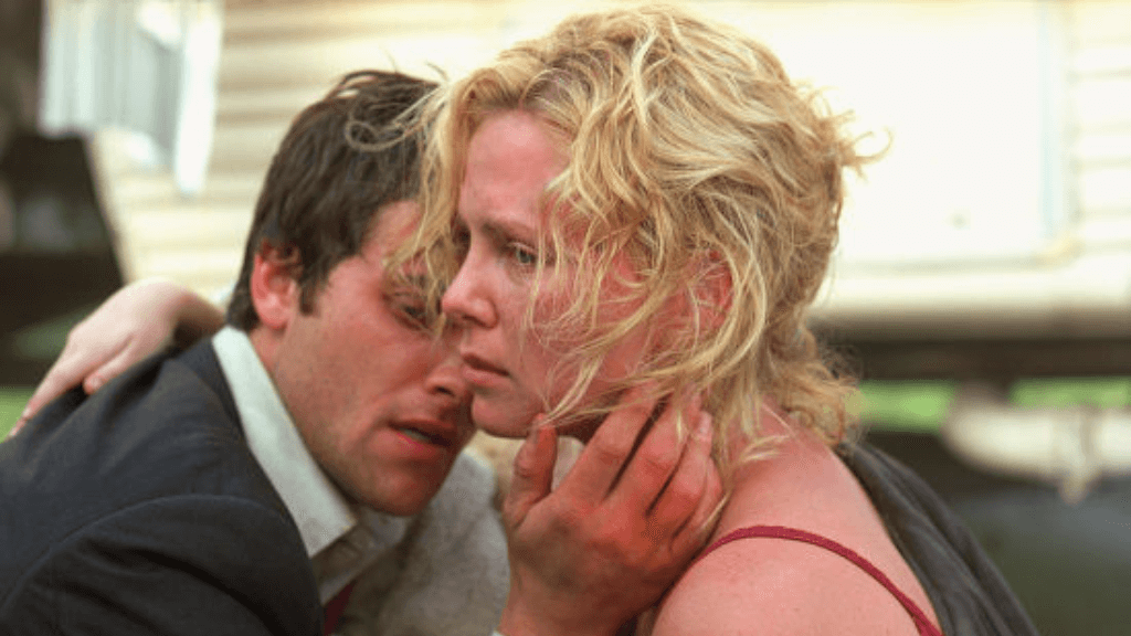Stuart Townsend and Charlize Theron in Trapped | Credits: Columbia Pictures