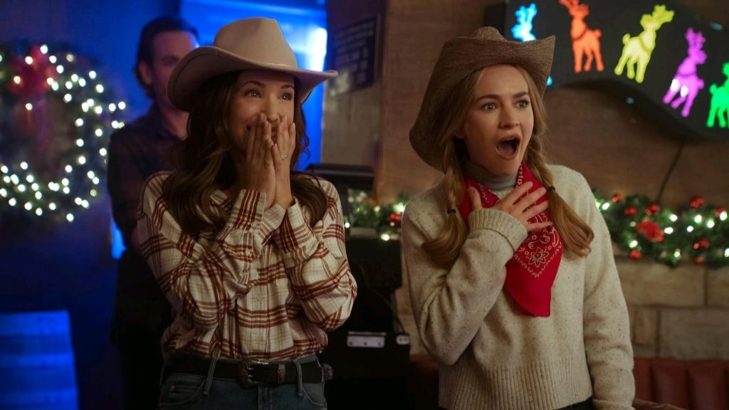 Marla Sokoloff and Britt Robertson in The Merry Gentleman (2024) | Image via Netflix