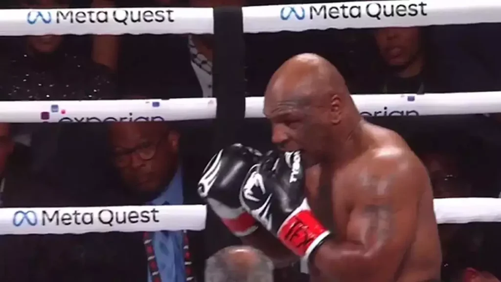 Mike Tyson biting his thumb