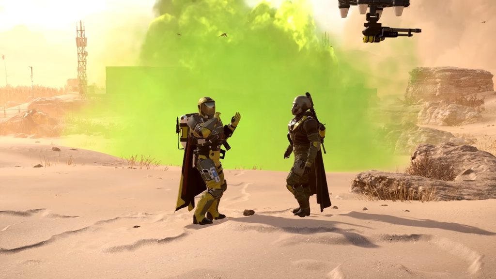 Screenshot of two Helldivers in Helldivers 2 doing emotes while an Orbital Gas Strike Stratagem goes off in the background.