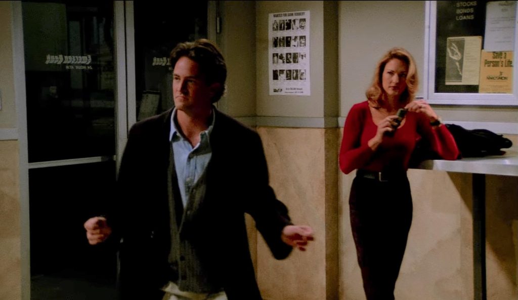 Chandler Bing stuck in an ATM with Jill Goodacre in the episode The One with the Blackout