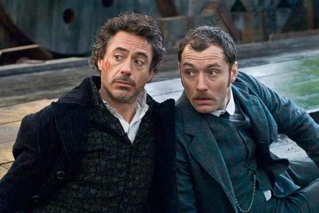 Robert Downey Jr. as Sherlock Holmes and Jude Law as Watson in Sherlock Holmes (2009) 