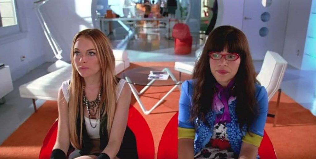 America Ferrera and Lindsay Lohan in a still from Ugly Betty (2006-2010)