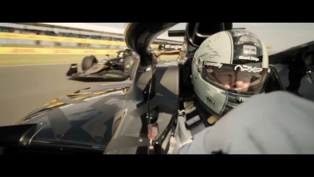 Brad Pitt Admits What Happened When He Raced Tom Cruise in Go Kart in His Prime 2 Brad Pitt driving in a still from F1