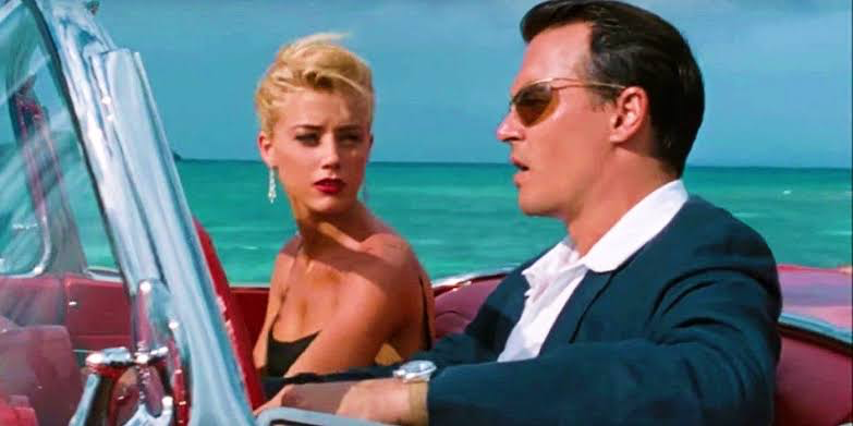 Amber Heard and Johnny Depp in a still from The Rum Diary.