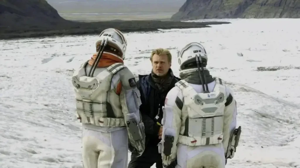 Christopher Nolan with Matt Damon and Matthew McConaughey on the sets of Interstellar | Credits: Paramount Pictures