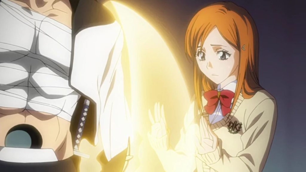 Orihime healing Grimmjows arm in Bleach Credits Studio Pierrot