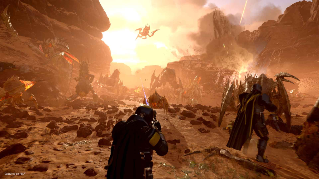 the image shows a player fighing bugs in Helldivers 2