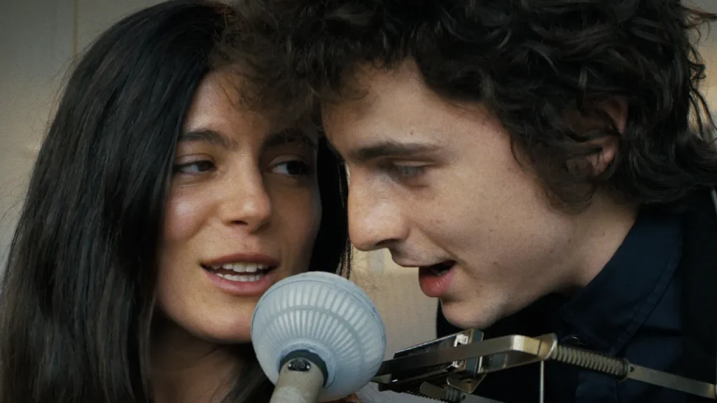 Monica Barbaro and Timothée Chalamet in a still from A Complete Unknown