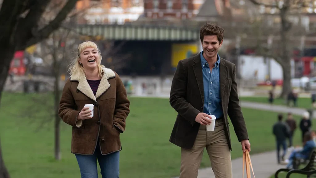 Florence Pugh and Andrew Garfield have a good time in a park