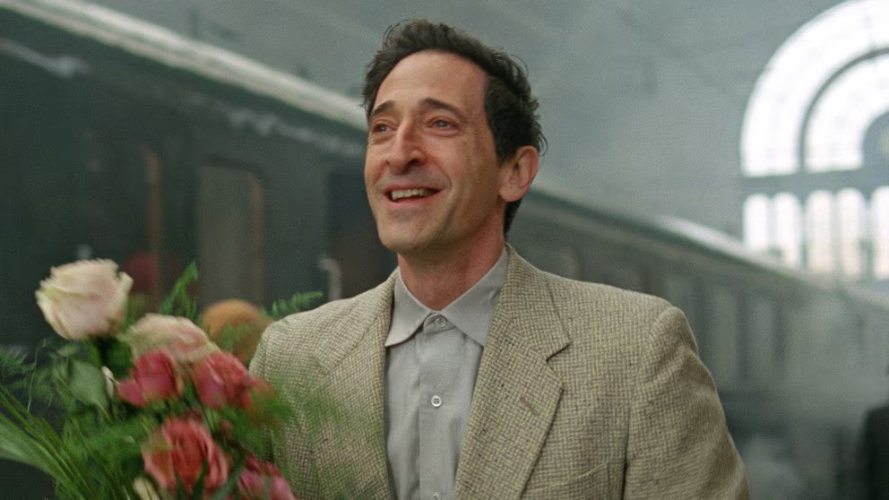 Adrien Brody as László Tóth, a Hungarian-Jewish Holocaust survivor who emigrates to America after World War II, in The Brutalist