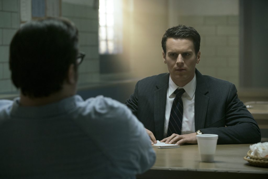 Jonathan Groff's Holden Ford in conversation with Cameron Britton's Edmund in Mindhunter 