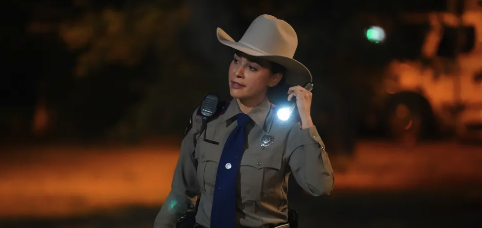 Lindsey Morgan as Micki Ramirez with a torch in hand