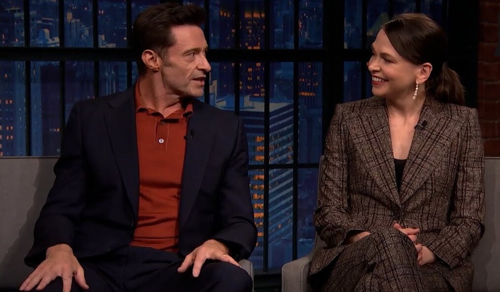 Hugh Jackman and Sutton Foster exchanging looks during an interview on Late Night with Seth Meyers