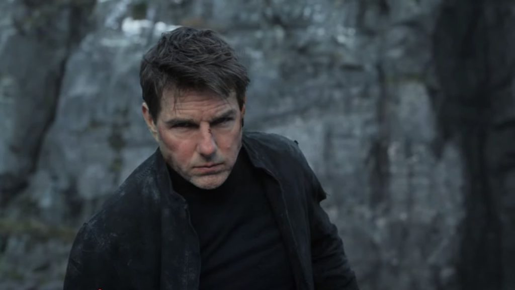 Tom Cruise standing before a cliff in Mission Impossible- Fallout