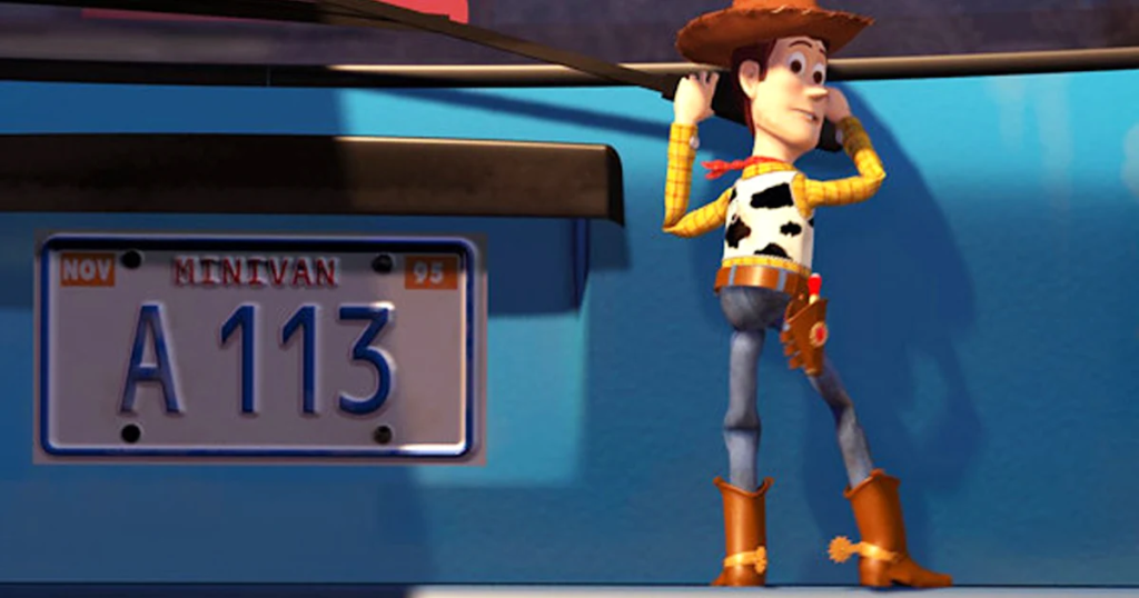 Woody stuck on a car in the Toy Story franchise, which features the iconic number A113