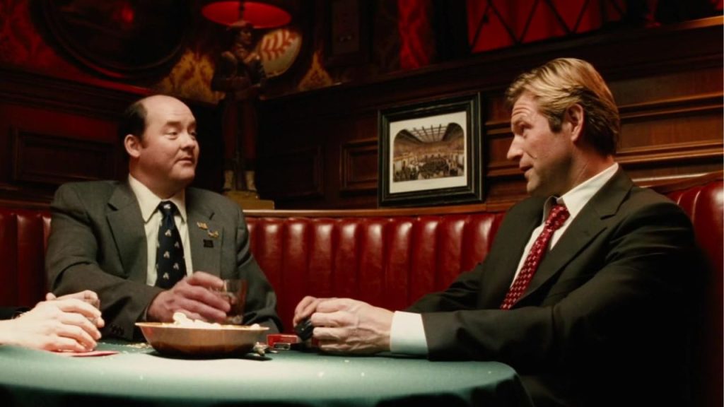 David Koechner and Aaron Eckhart having a discussion at a bar