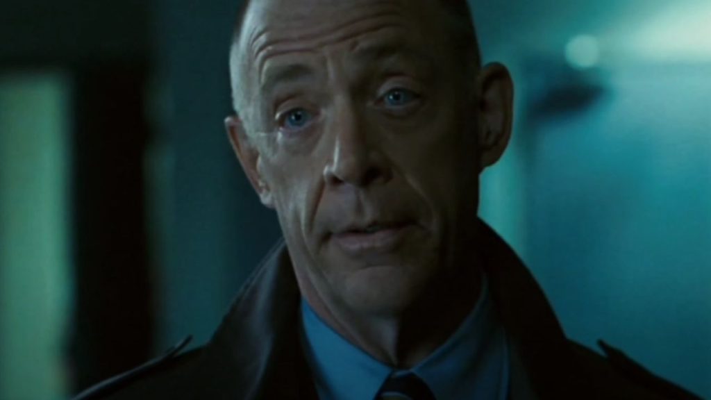 J.K. Simmons raising his eyebrows while explaining something in Rendition