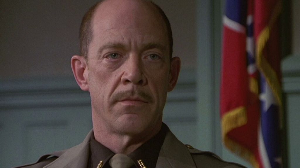 J.K. Simmons looking sternly in The Gift