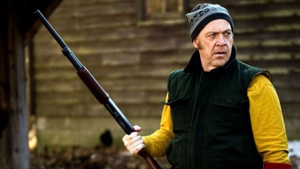 J.K. Simmons angrily holding a gun in The Vicious Kind