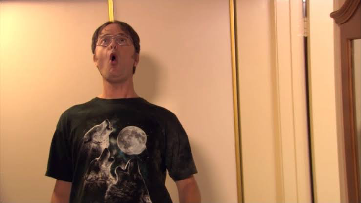 Rainn Wilson’s character Dwight wearing a wolf t-shirt in The Office 