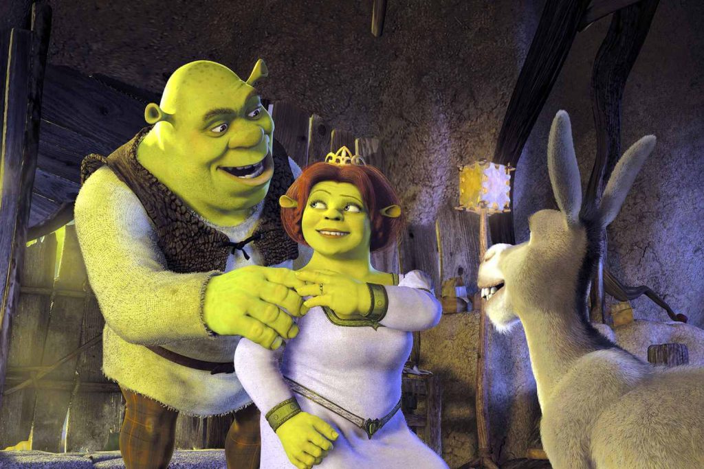 Shrek, Fiona, and Donkey in a still from the Shrek film series