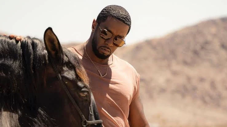 P Diddy in a music video with a horse